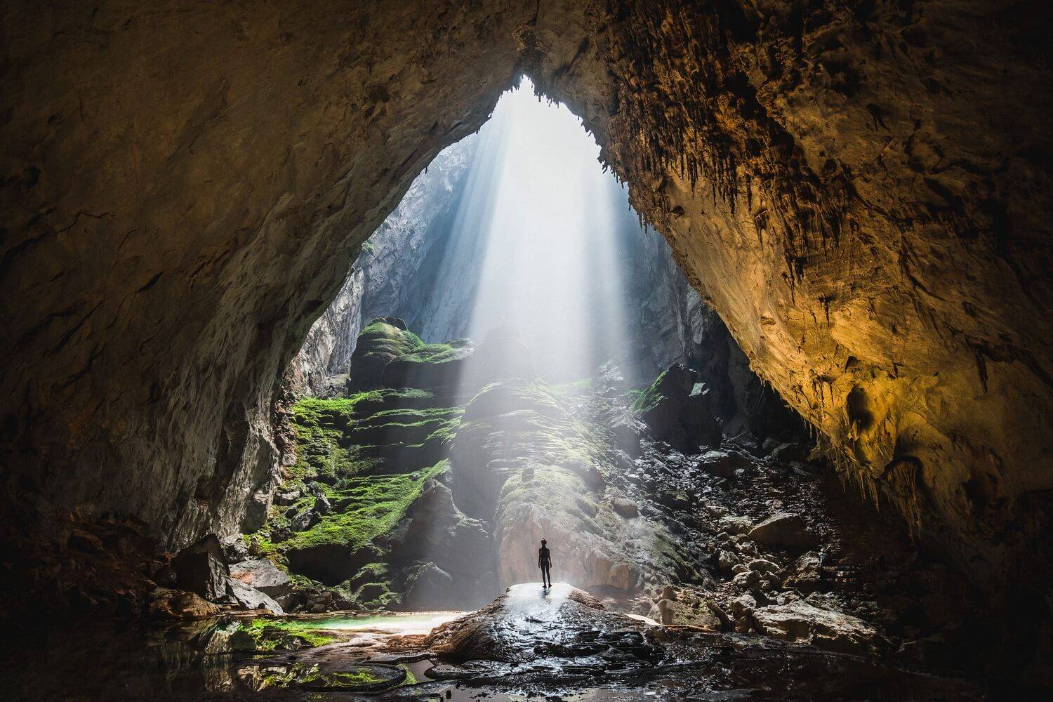 This is Watch Out for Dinosaurs in Son Doong Cave, which has a beautiful sunbeam