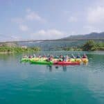 Visit Dark Cave for ziplining, mud baths, and jungle adventures