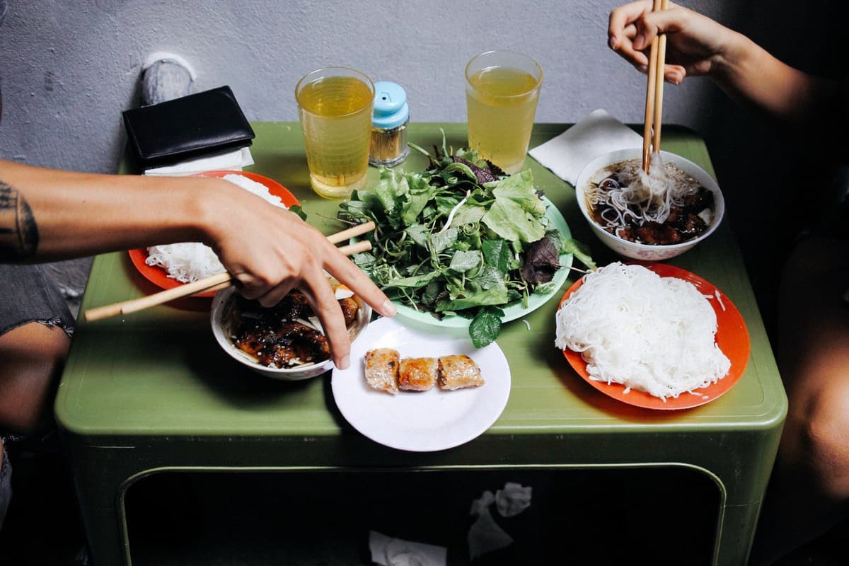 What to Do in Vietnam: Top 10 Must-Dos 3 Every sizzling pan in Hanoi’s alleys tells a story of local street food passion.