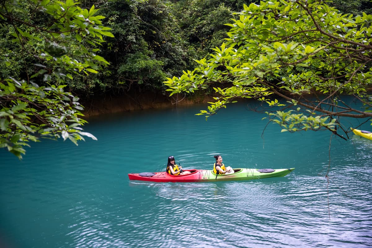 Phong Nha in spring: Embrace the beauty of nature in bloom 2 Enjoy kayaking on crystal-clear, emerald-green waters