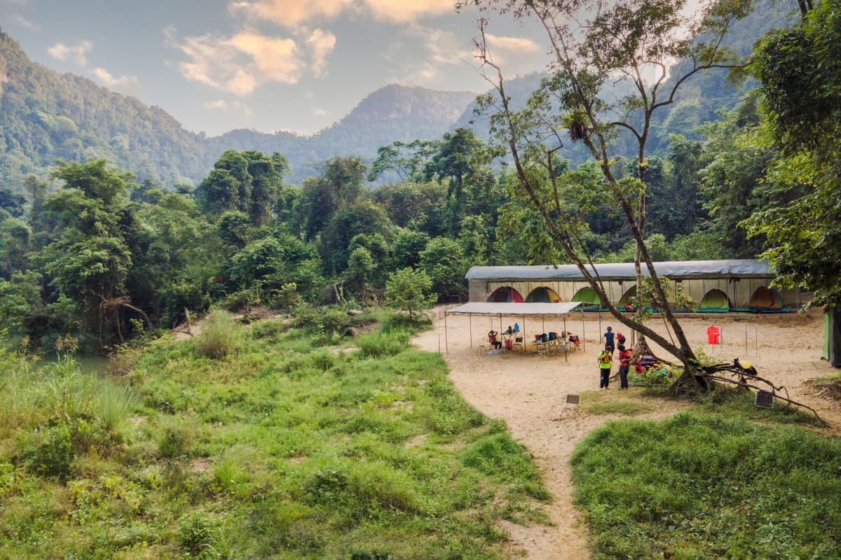 An overnight campsite surrounded by the untouched landscapes of the Tu Lan Cave System