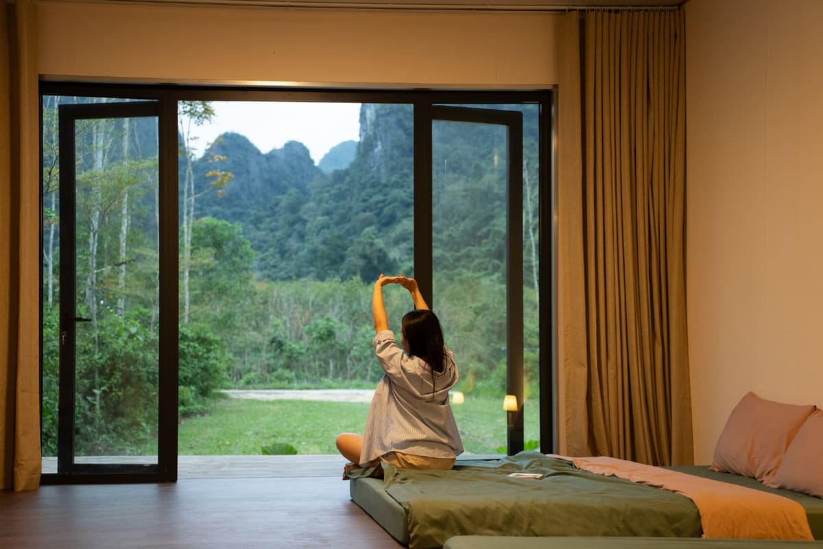 Blue Diamond Retreat: A Nature-Inspired Retreat in Phong Nha - Ke Bang 4 Large glass windows in every room bring the beauty of nature right into the living space